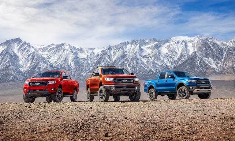 2023 Ford Ranger three parked side by side in front of mountain range
