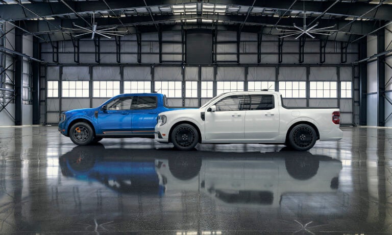 Two 2025 Ford Maverick parked in a warehouse