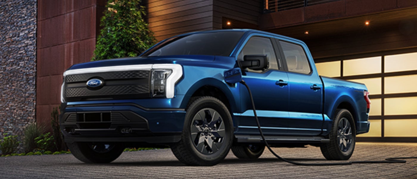 2025 Ford F-150 Lightning Blue Parked While Charging At Home
